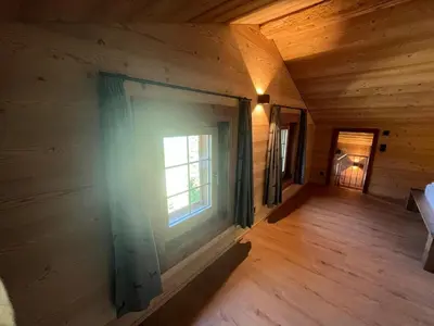 Ein Bett oder Betten in einem Zimmer der Unterkunft Chalet Swissalp Top Flitterwochen, Auszeit, Erholung