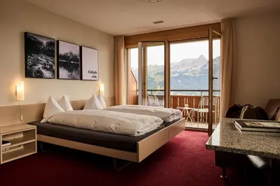 Ein Bett oder Betten in einem Zimmer der Unterkunft Auszeit-Hotel Z Aeschiried