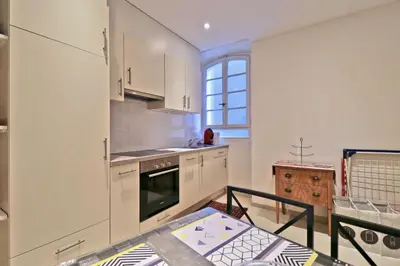 Küche/Küchenzeile in der Unterkunft Charmant appartement au cœur de Sion