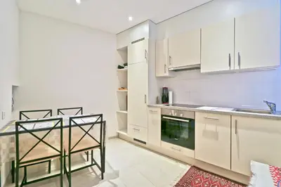 Küche/Küchenzeile in der Unterkunft Charmant appartement au cœur de Sion