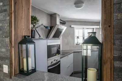 Küche/Küchenzeile in der Unterkunft Chalet Josianne