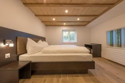 Ein Bett oder Betten in einem Zimmer der Unterkunft Haus Bergsonne