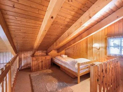 Ein Bett oder Betten in einem Zimmer der Unterkunft Chalet Eloise by Interhome