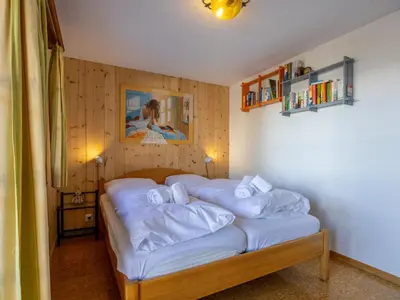 Ein Bett oder Betten in einem Zimmer der Unterkunft Chalet L'Alouette by Interhome