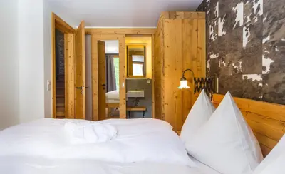 Ein Bett oder Betten in einem Zimmer der Unterkunft Chalet Black Pearl