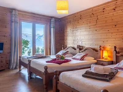 Ein Bett oder Betten in einem Zimmer der Unterkunft Chalet Agneau by Interhome