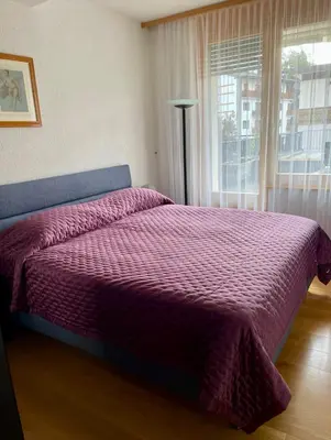 Ein Bett oder Betten in einem Zimmer der Unterkunft Crans center and close to the ski lifts