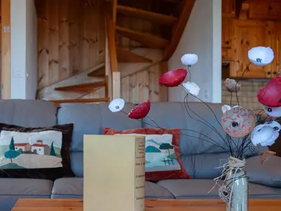 Ein Sitzbereich in der Unterkunft Chalet Valet de Coeur by Interhome