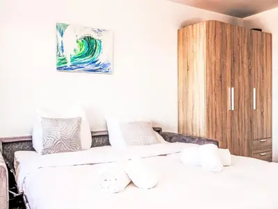 Ein Bett oder Betten in einem Zimmer der Unterkunft Apartment Arnica 16 by Interhome
