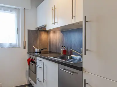 Küche/Küchenzeile in der Unterkunft Apartment Les Arolles A1 by Interhome