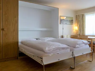 Ein Bett oder Betten in einem Zimmer der Unterkunft Apartment Beaulieu-2 by Interhome