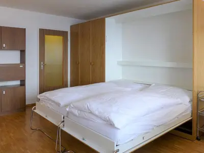 Ein Bett oder Betten in einem Zimmer der Unterkunft Apartment Beaulieu-2 by Interhome