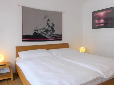 Ein Bett oder Betten in einem Zimmer der Unterkunft Apartment Roger-1 by Interhome