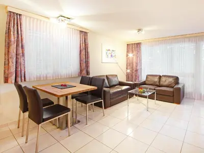 Ein Sitzbereich in der Unterkunft Apartment Roger-2 by Interhome