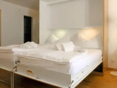 Ein Bett oder Betten in einem Zimmer der Unterkunft Apartment Beaulieu-3 by Interhome