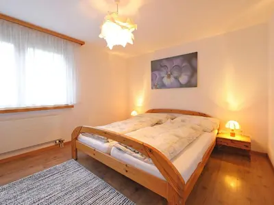 Ein Bett oder Betten in einem Zimmer der Unterkunft Apartment Les Violettes-2 by Interhome