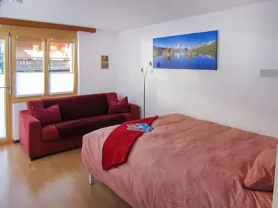 Ein Bett oder Betten in einem Zimmer der Unterkunft Apartment Sungold-1 by Interhome