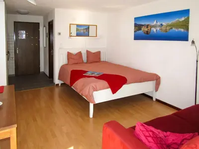 Ein Bett oder Betten in einem Zimmer der Unterkunft Apartment Sungold-2 by Interhome