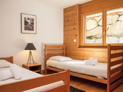 Ein Bett oder Betten in einem Zimmer der Unterkunft Apartment Grands Ducs 101G by Interhome