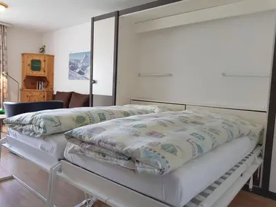 Ein Bett oder Betten in einem Zimmer der Unterkunft Apartment Castor und Pollux-2 by Interhome