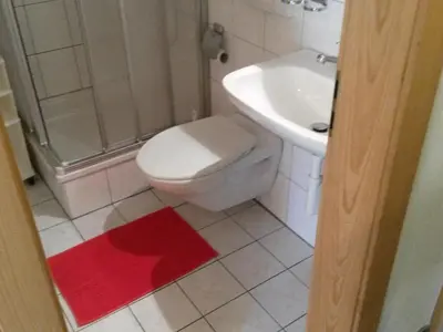 Ein Badezimmer in der Unterkunft Apartment ABC Ferienwohnung 1 1- OG Süd by Interhome