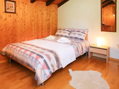 Ein Bett oder Betten in einem Zimmer der Unterkunft Chalet Chalet Praline by Interhome
