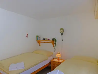 Ein Bett oder Betten in einem Zimmer der Unterkunft Apartment Rustica Apt- M by Interhome