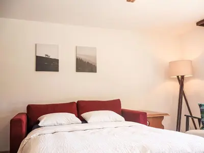Ein Bett oder Betten in einem Zimmer der Unterkunft Apartment Gemmi by Interhome