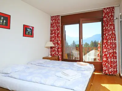 Ein Bett oder Betten in einem Zimmer der Unterkunft Apartment Les Faverges 8 by Interhome