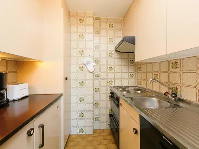 Küche/Küchenzeile in der Unterkunft Apartment Les Faverges 5 by Interhome