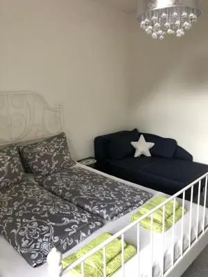 Ein Bett oder Betten in einem Zimmer der Unterkunft Apartment by Mario