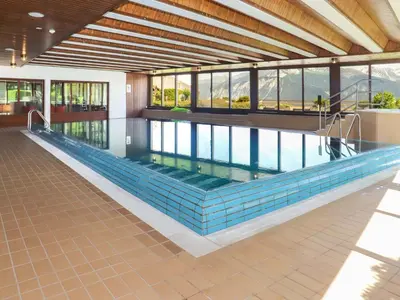 Der Swimmingpool an oder in der Nähe von Apartment Terrasse Des Alpes 708 by Interhome