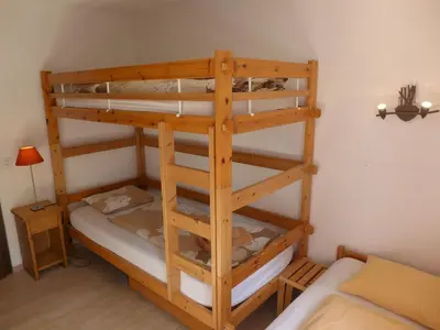 Ein Bett oder Betten in einem Zimmer der Unterkunft Apartment Terrasse Des Alpes 917 by Interhome