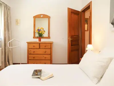 Ein Bett oder Betten in einem Zimmer der Unterkunft Apartment Marigny Andolla 23 by Interhome