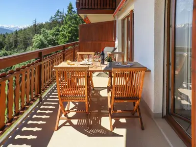 Ein Balkon oder eine Terrasse in der Unterkunft Apartment Marigny Andolla 23 by Interhome