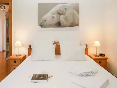 Ein Bett oder Betten in einem Zimmer der Unterkunft Apartment Marigny Andolla 23 by Interhome