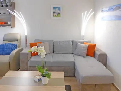 Ein Sitzbereich in der Unterkunft Apartment Barzettes-Vacances 553 - Entrée N- 14 by Interhome
