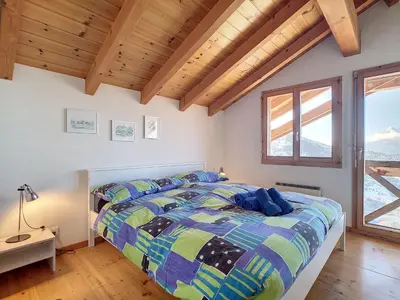 Ein Bett oder Betten in einem Zimmer der Unterkunft Chalet au Bisse by Interhome