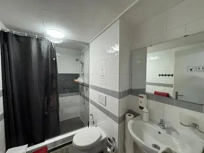 Ein Badezimmer in der Unterkunft Downtown Family&Friends