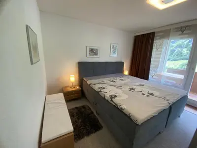Ein Bett oder Betten in einem Zimmer der Unterkunft Lärchenwald 1804