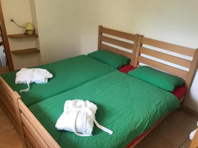 Ein Bett oder Betten in einem Zimmer der Unterkunft Agri Scinghiöra