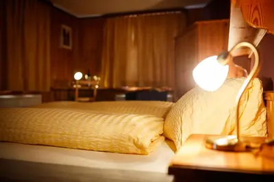 Ein Bett oder Betten in einem Zimmer der Unterkunft Hotel Nufenen