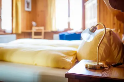 Ein Bett oder Betten in einem Zimmer der Unterkunft Hotel Nufenen
