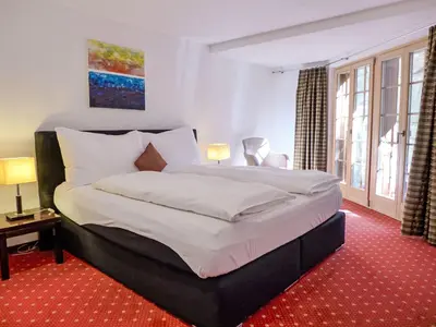 Ein Bett oder Betten in einem Zimmer der Unterkunft Apartment Chalet Smaragd-3 by Interhome