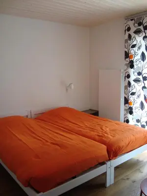 Ein Bett oder Betten in einem Zimmer der Unterkunft Les Mouresses