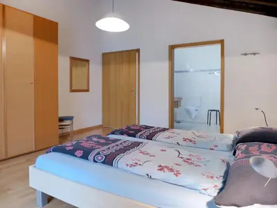 Ein Bett oder Betten in einem Zimmer der Unterkunft Apartment von Allmen by Interhome