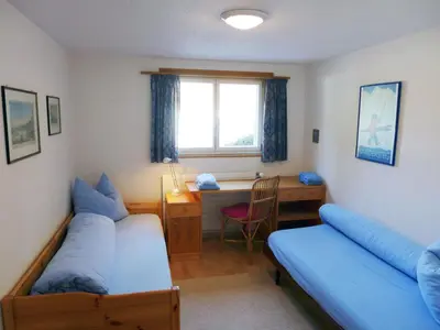 Ein Bett oder Betten in einem Zimmer der Unterkunft Holiday Home Chalet Marietta by Interhome