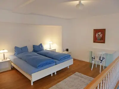 Ein Bett oder Betten in einem Zimmer der Unterkunft Studio Galeriestudio Jungfraublick by Interhome