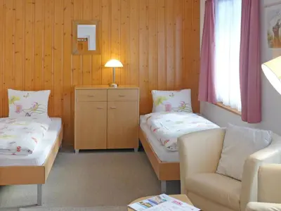 Ein Bett oder Betten in einem Zimmer der Unterkunft Apartment Chalet Bärgsunna-1 by Interhome