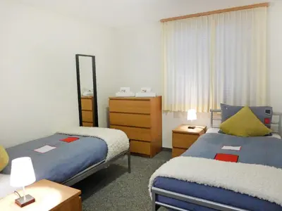 Ein Bett oder Betten in einem Zimmer der Unterkunft Apartment Chalet Perle by Interhome